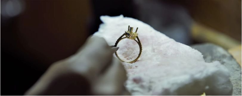 Close setting diamond jewellery being crafted by hand