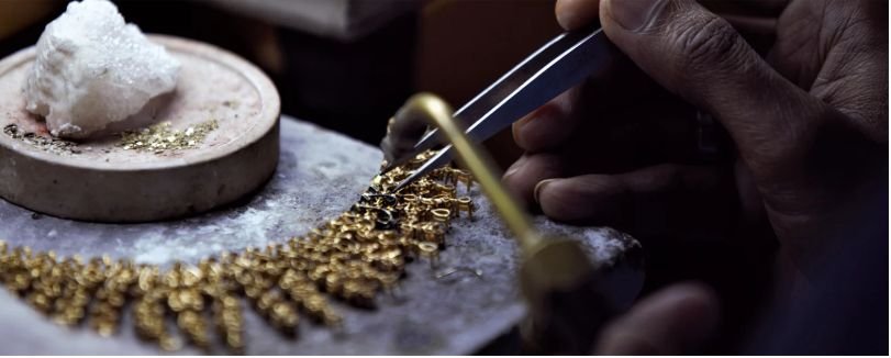 Diamond ring held in setting wax during job work